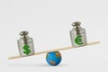 Dollar and euro symbols on balance scale - Concept of dollar dominance over euro in global markets