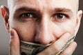 Dollar gag shut voiceless man Royalty Free Stock Photo