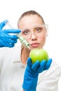 Dollar injection into green apple Royalty Free Stock Photo