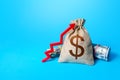 Dollar money bag and red up arrow. Economic growth, GDP. Rise in profits, budget fees. Inflation acceleration. Increase income Royalty Free Stock Photo