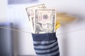 Dollar savings hidden in a sock Royalty Free Stock Photo