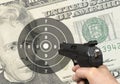 Dollar shooting Royalty Free Stock Photo
