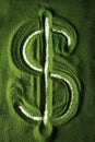 Dollar sign drawn in colour sand. Conceptual image Royalty Free Stock Photo