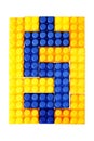Dollar sign made from building block of meccano Royalty Free Stock Photo