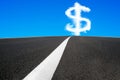 Dollar sign shape cloud in blue sky with asphalt road