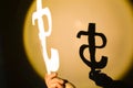 Dollar sign in the spotlight. Currency concept. Spending money