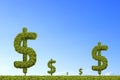 Dollar signs are increasing with blue sky background. Royalty Free Stock Photo