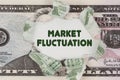 The dollar is torn in the center. In the center it is written - MARKET FLUCTUATION Royalty Free Stock Photo