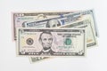 5, 20, 50, 100 dollars banknotes at different angles. Close up of dollars on white background. Royalty Free Stock Photo