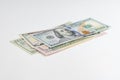 5, 20, 50, 100 dollars banknotes at different angles. Close up of dollars on white background. Royalty Free Stock Photo