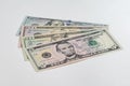 5, 20, 50, 100 dollars banknotes at different angles. Close up of dollars on white background. Royalty Free Stock Photo