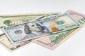 5, 20, 50, 100 dollars banknotes at different angles. Close up of dollars on white background. Royalty Free Stock Photo