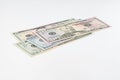 5, 20, 50, 100 dollars banknotes at different angles. Close up of dollars on white background. Royalty Free Stock Photo