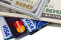 Dollars and credit cards Visa and Mastercard Royalty Free Stock Photo