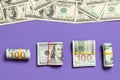 Dollars currency on colored background top view, with empty place for your text business money concept. One hundred dollar bills Royalty Free Stock Photo