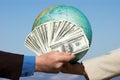 Dollars and earth Royalty Free Stock Photo