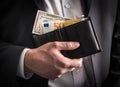 Dollars and euros in wallet. Royalty Free Stock Photo