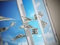 Dollars flying out of the window. 3D illustration