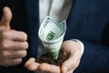 100 dollars growing money in businessman hands Royalty Free Stock Photo