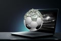 Dollars are inside the soccer ball, the ball is full of money. Sports betting, soccer betting, gambling, bookmaker, big win Royalty Free Stock Photo