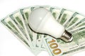 Dollars, light bulb isolated on white Royalty Free Stock Photo