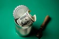 Dollars in an open tin can and a snippet. Safeguarding cash, stash concept. Time to get the deferred, accumulated money