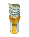 Dollars on a Prescription Bottle Royalty Free Stock Photo