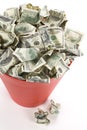 Dollars in Red Garbage Can Royalty Free Stock Photo