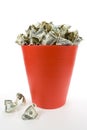 Dollars in Red Garbage Can Royalty Free Stock Photo