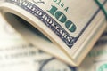 Dollars rolled closeup. American Dollars Cash Money. One Hundred Dollar Banknotes Royalty Free Stock Photo