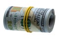 100 dollars rolled into a roll isolated on white background.