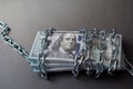 Dollars tied up with a chain Royalty Free Stock Photo