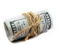Dollars twisted into a roll isolated on white background. Royalty Free Stock Photo