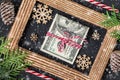 Dollars on wooden photo frame. Christmas gift Royalty Free Stock Photo