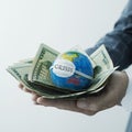 Dollars and world globe with mask and text crisis Royalty Free Stock Photo