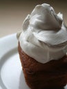 Dollop of cream on cake Royalty Free Stock Photo