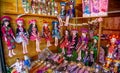 Dolls dressed in bright colours