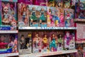 Large selection of Disney Barbie dolls and others on the shelves of the toy store. Minsk, Belarus, 2023