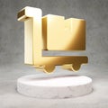 Dolly Flatbed icon. Shiny golden Dolly Flatbed symbol on white marble podium