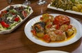 Dolma with cabbage, eggplant, tomatoes and pepper. Cabbage rolls with meat, rice and vegetables