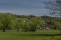 Dolni Becva village in spring color fresh green day with church and meadows Royalty Free Stock Photo