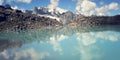 Dolomite Lake at Uzunkol, Caucasus Mountains. Bright blue alpine lake.