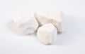 Dolomite mineral stones heep on white background. Royalty Free Stock Photo