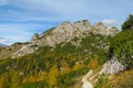 Dolomite mountains, Alpi Dolomiti in autumn yellow colors Royalty Free Stock Photo