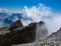 Dolomite rocks on the Tofana di Mezzo, blue sky and clouds