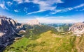 Dolomites - Beautiful panoramic sunset landscape at Gardena Pass Passo Giau near Ortisei. Stunning airial view on the