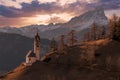 Dolomites mountain church at sunset Royalty Free Stock Photo