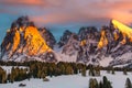 Dolomites mountains with snow at susnet - Alpe di Siusi