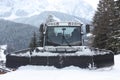 Dolomites skiing resort. Snowcat. Snow remover equipment.