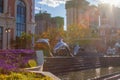 Dolphin architectures and water fountain in front of apartment building